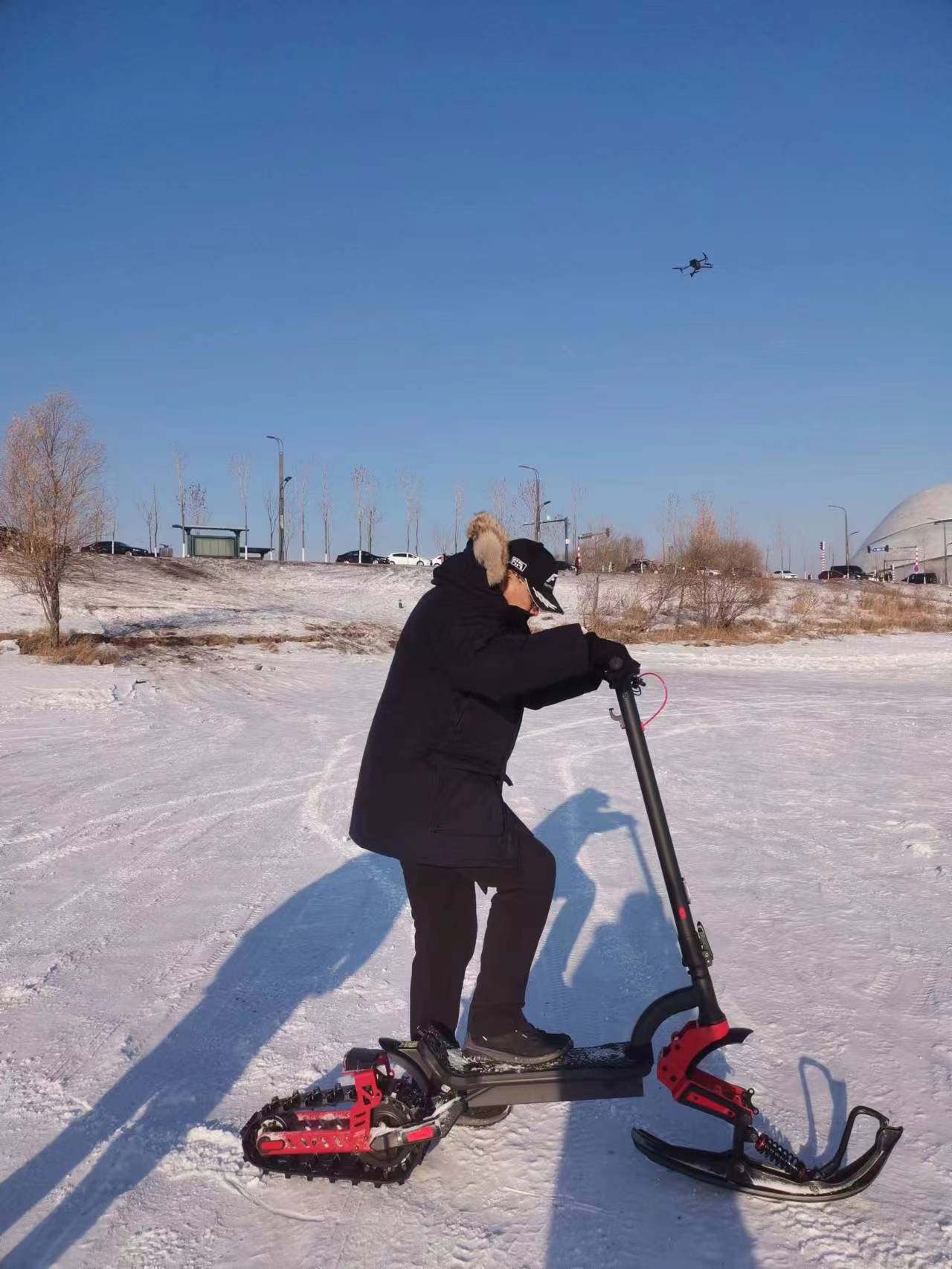 S12PRO snow scooters at a snow resort
